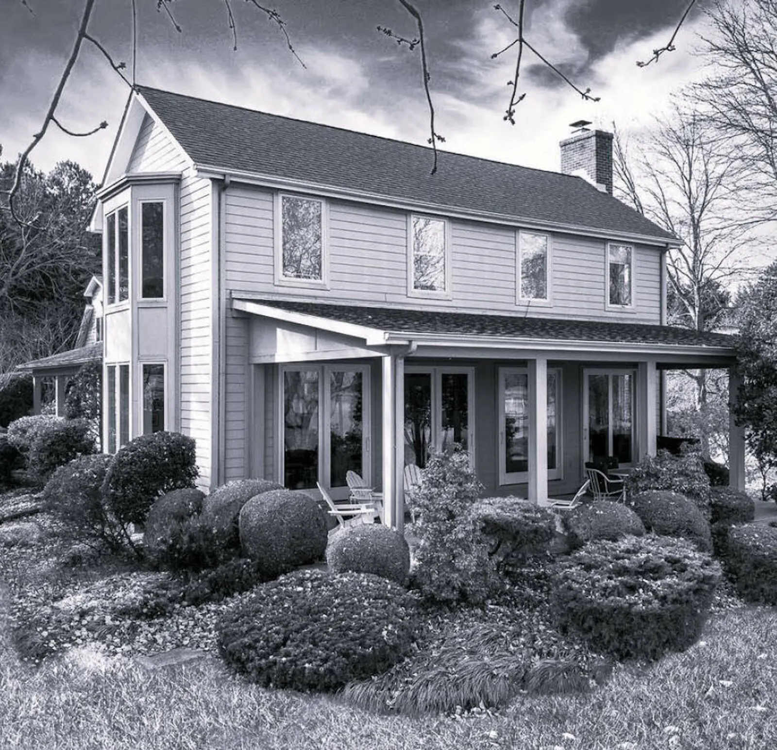 A before-and-after comparison of the 1923 structure before its transformation, as well as the end result 