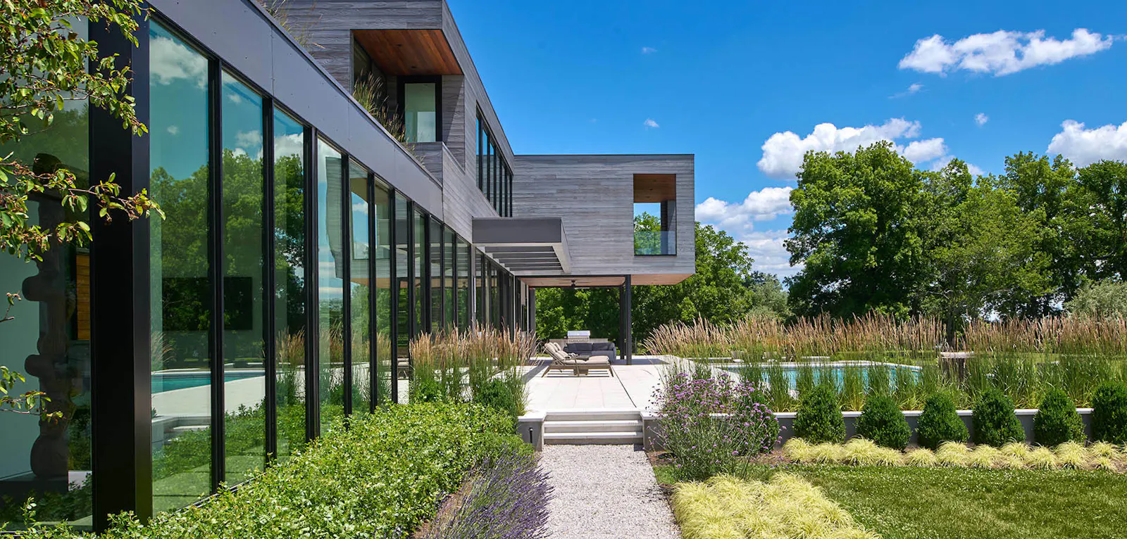 The exterior of the home is designed to reflect its natural surroundings. 