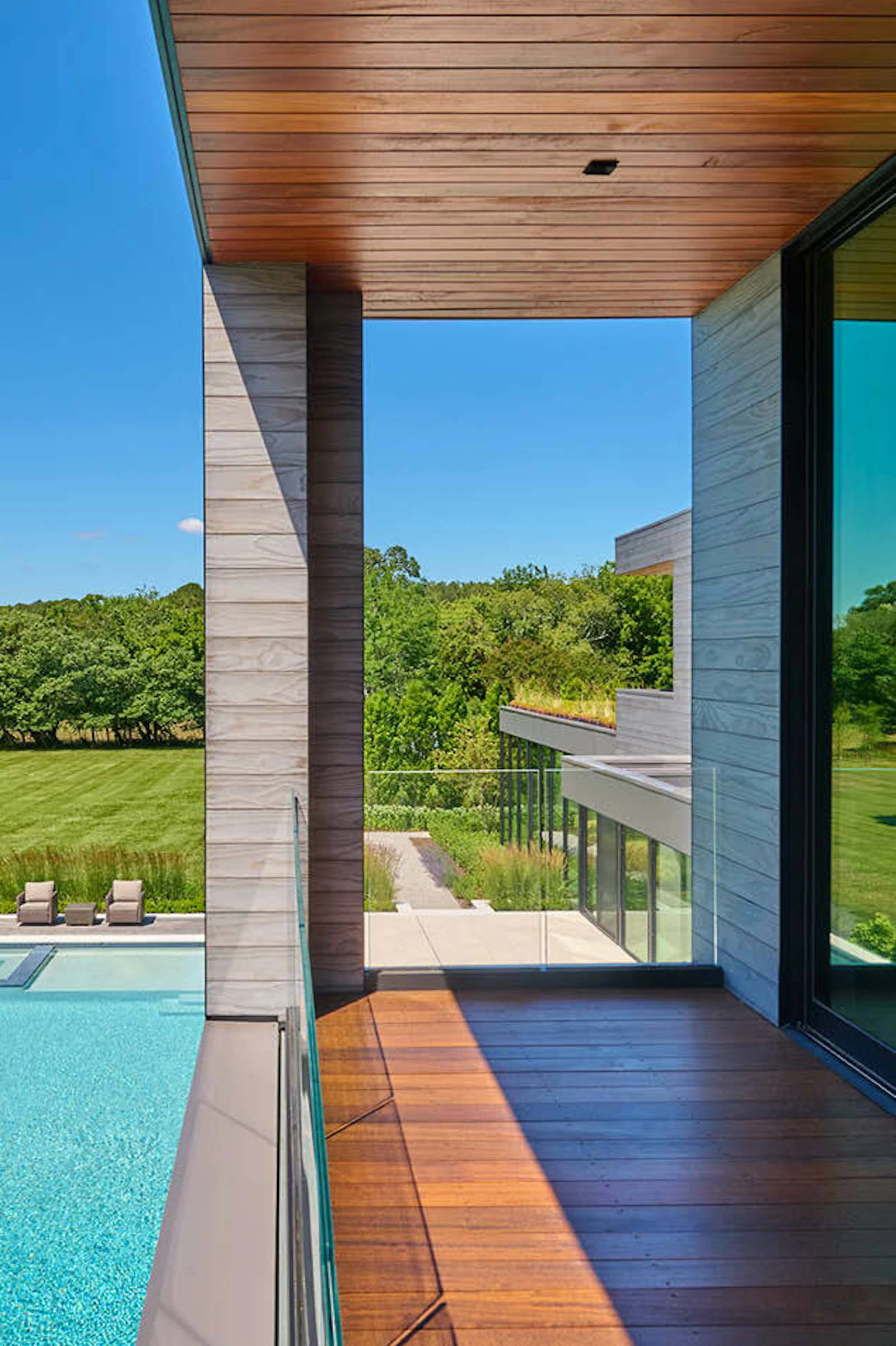 Views from the interior look out over the pool and river. 
